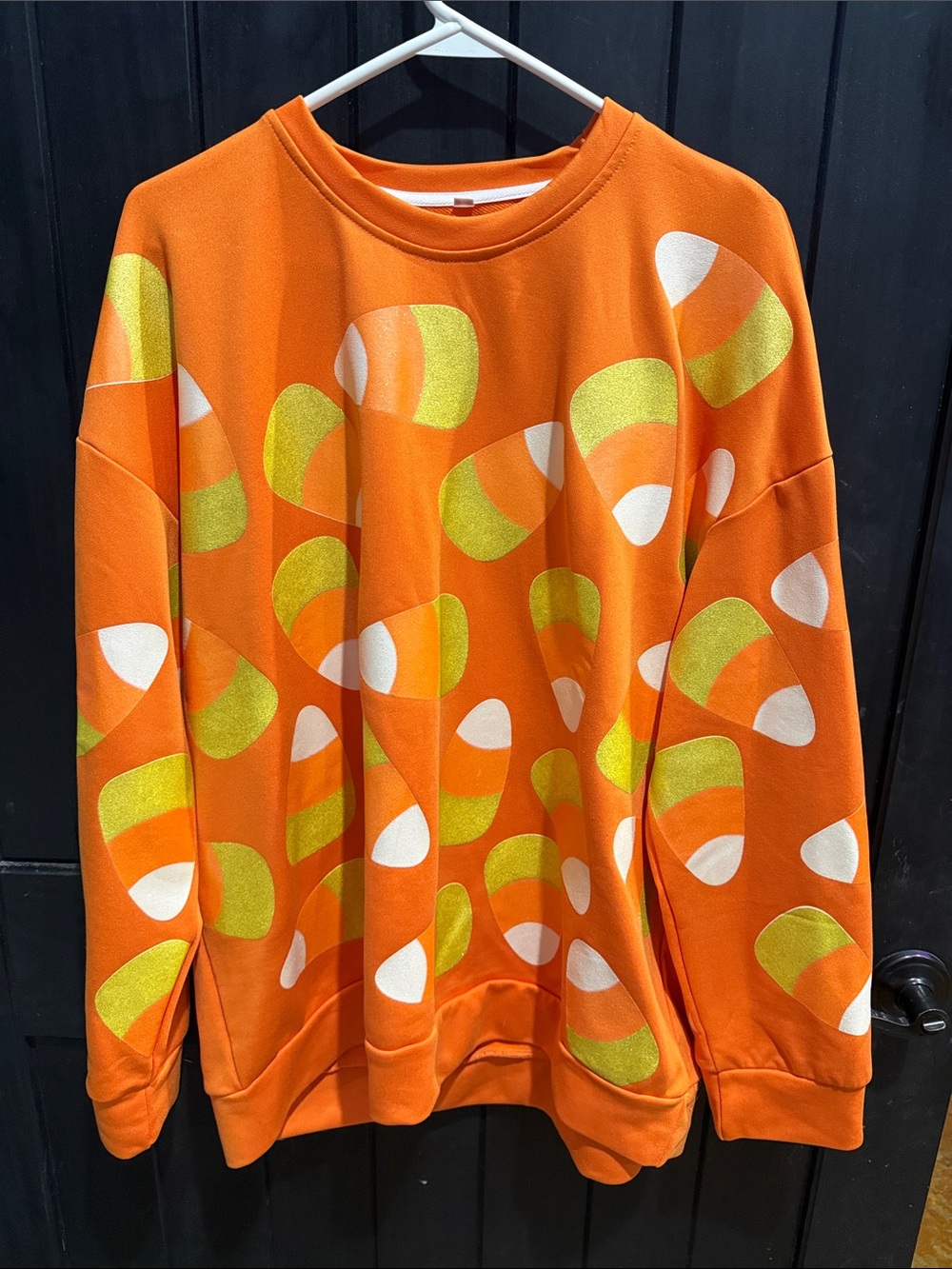 Bright Orange Crewneck Sweater with Lime and White Graphic Accents
